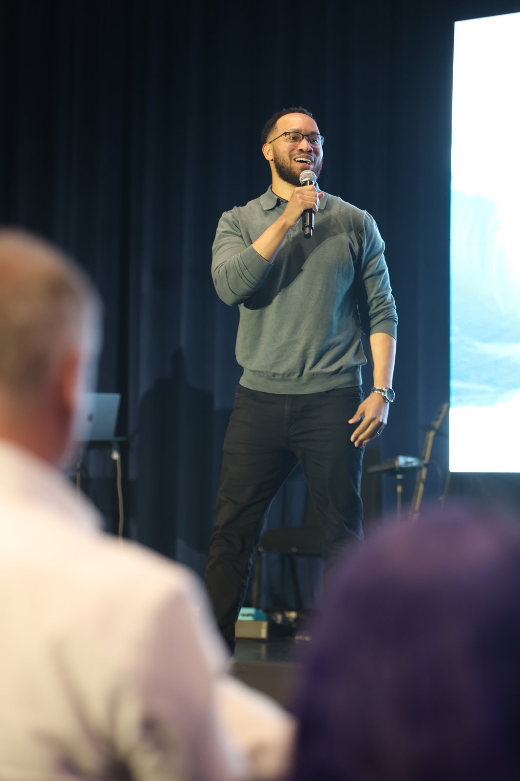 John C. York preaching on stage